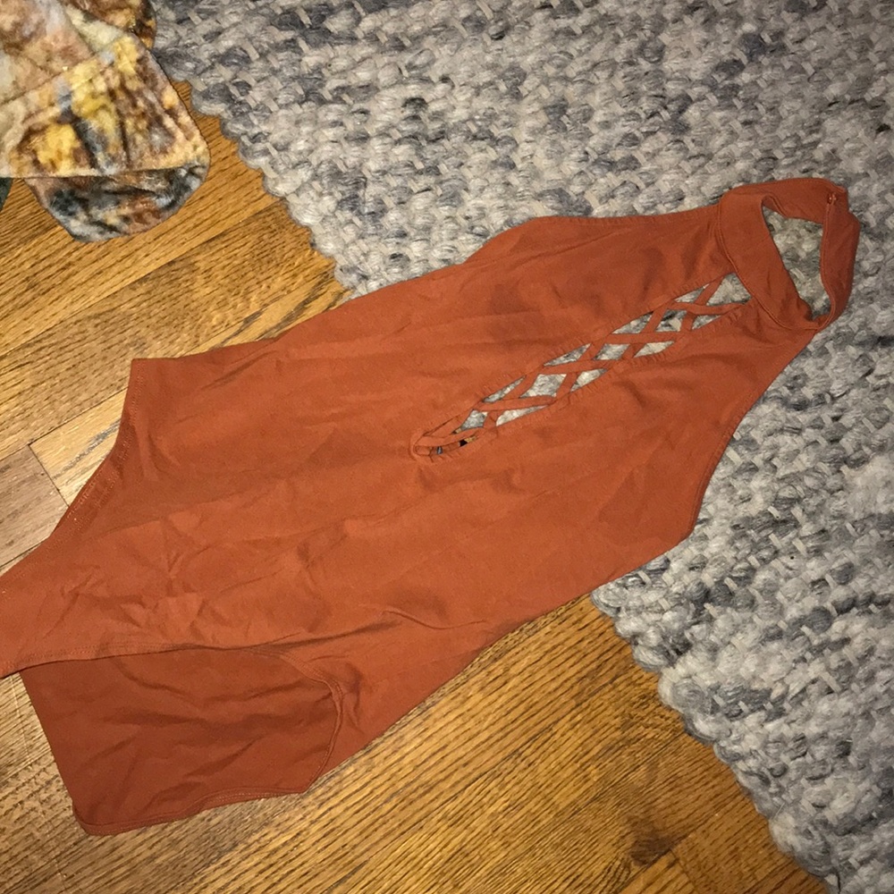 Burnt orange body suite